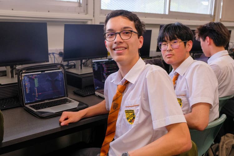 students with their laptops